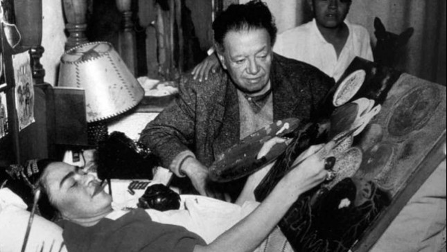 Frida Kahlo painting laying down