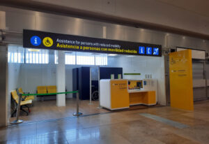 Airport reduced mobility assistance desk for people with reduced mobility Airport reduced mobility assistance desk for people with reduced mobility at Terminal 2 of Adolfo Suárez Madrid-Barajas Airport.
