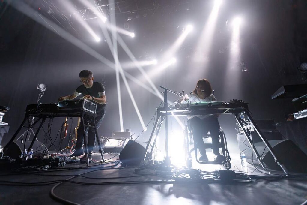 Katcross in concert. Musician in a wheelchair. Katcross in concert. Musician in a wheelchair.
